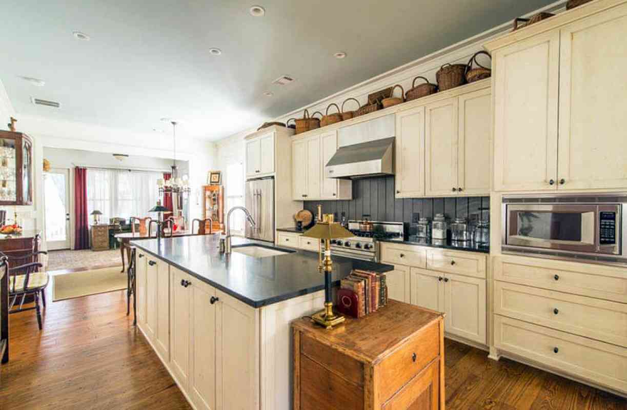 What Can You Do With All That Space Above the Kitchen Cabinets?